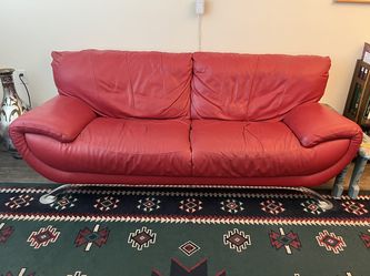 Red Leather Sofa 7' X 3' X 18". FREE