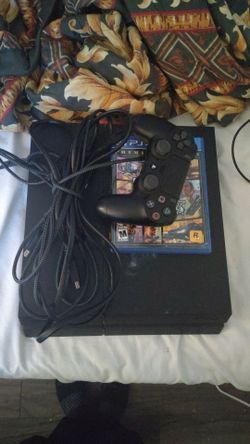 PS4 Console with Controller and GTA V
