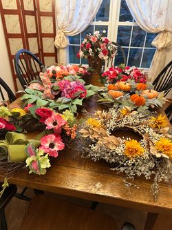 Rose basket centerpiece or five wreaths.