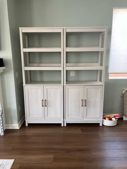 Two white wash finish bookcases