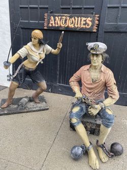 Two Vintage Pirate Statue s