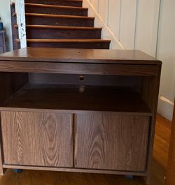 TV stand / table. Swivel. 20.00.  Piece needs to be replaced. See pic