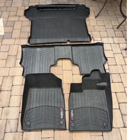 VW ID.4 WeatherTech floor mats and cargo liner with bumper protection