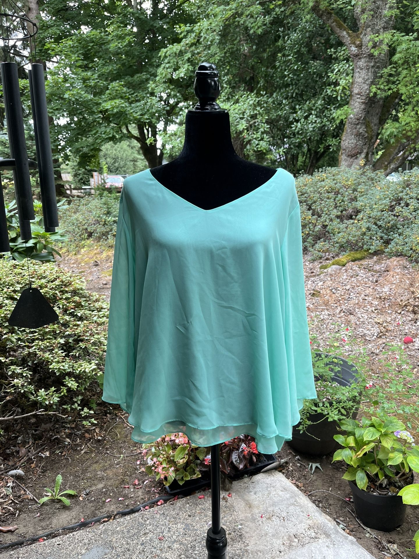 Jennifer Lopez brand flowy mint green top