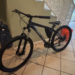 SHOOT ME OFFERS ozark trail bike only road it 3 times just put new tires. 27.5 inch PICK UP ONLY!!