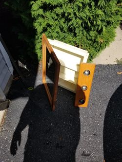 Needs to go small bathroom mirror with matching light fixture set great condition dont need
