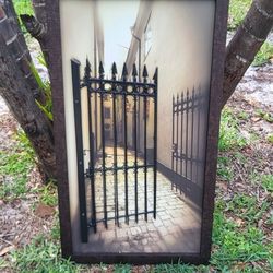 Framed Photograph With Metal Gate 