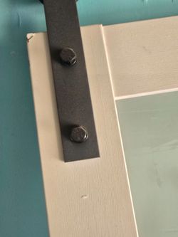 New barn door with rail.