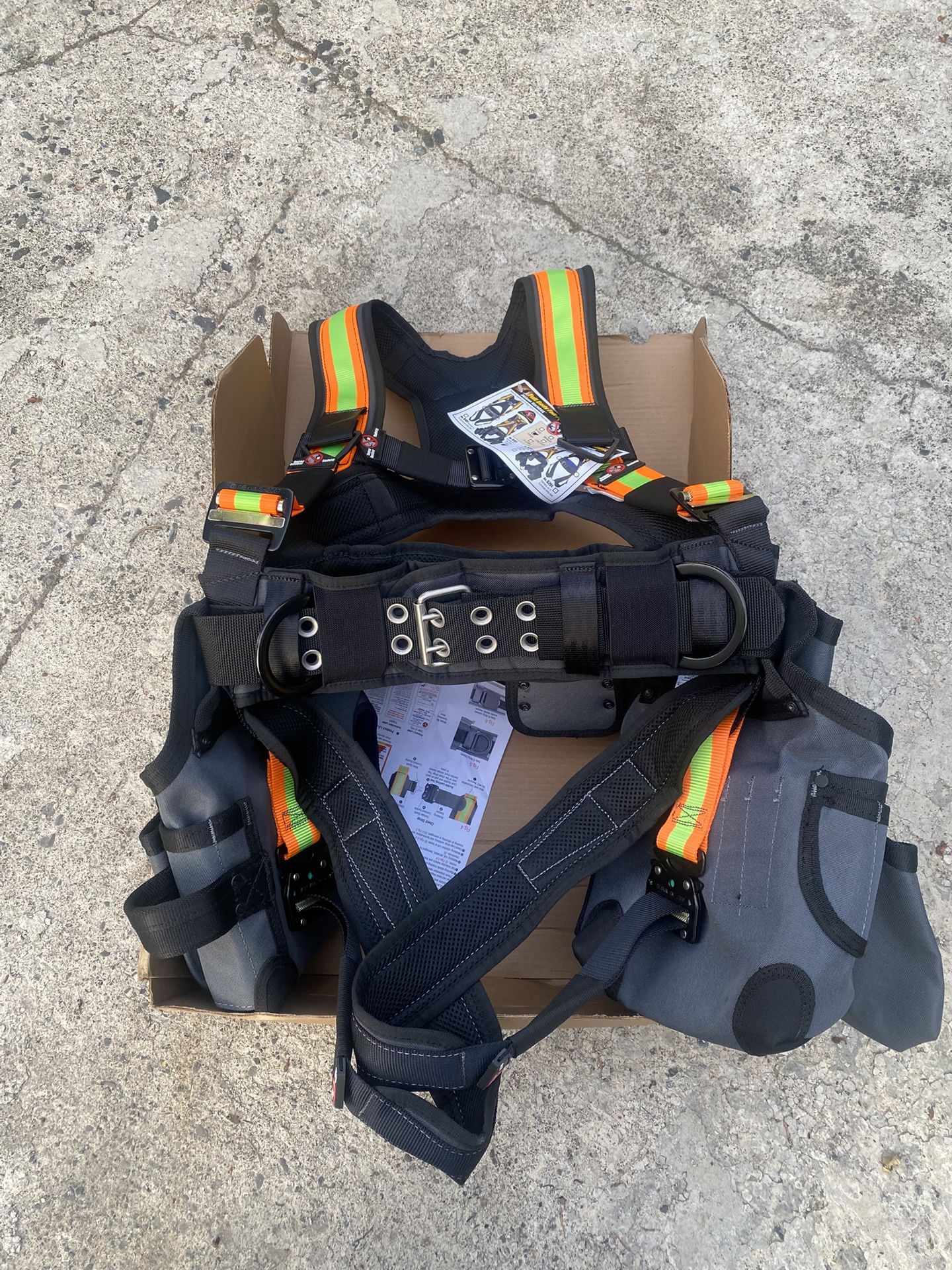 A Brand New Harness W/ Tool Bag And Hammer Holder