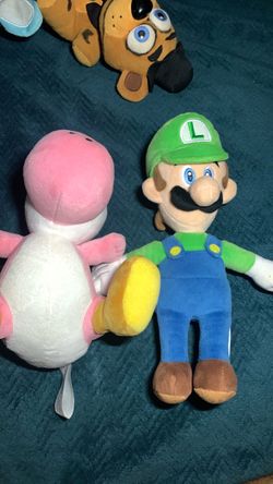 Mario plushies: Luigi and pink yoshi