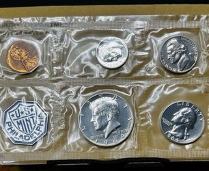 1964 Silver Mint Sets w/ original envelope and certificate of authenticity.  $60