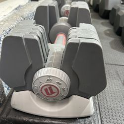 Universal powerpak adjustable dumbbells with stand hotsell