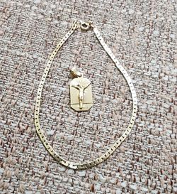 14k gold bracelet and pendant.