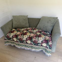 Sage Green Loveseat with Vintage Floral Throw