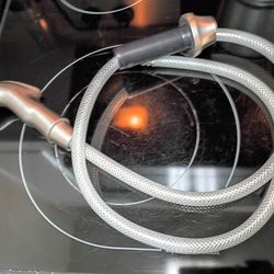 Sink side sprayer delta