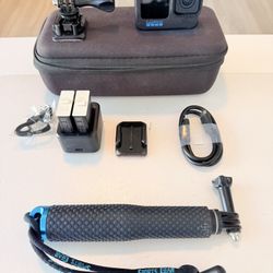 GoPro Hero 11 Black with Extra Batteries and Adventure Kit