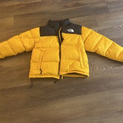 The North Face 1996 Retro Nuptse puffer jacket in yellow and black