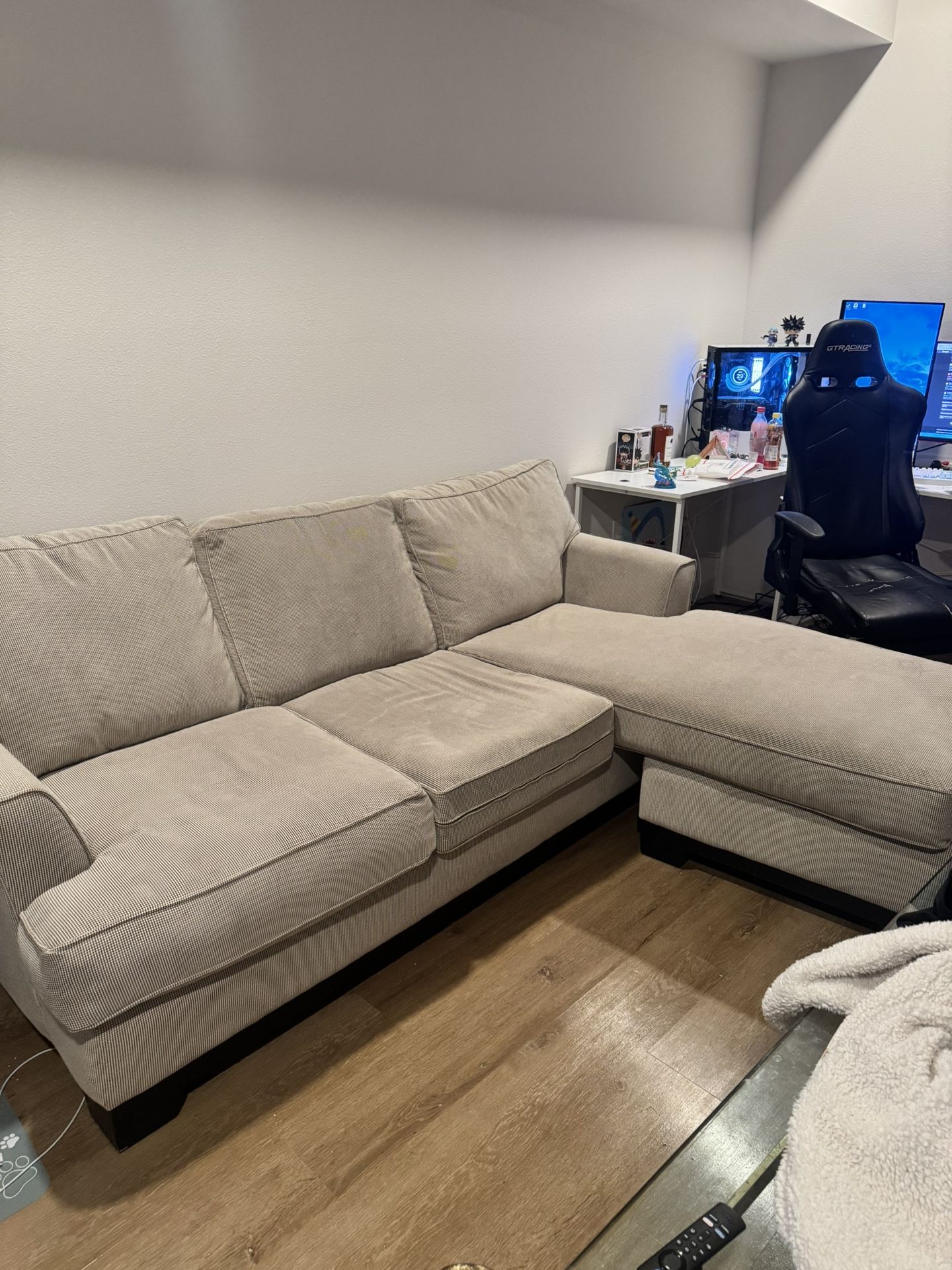 beige L-shaped couch