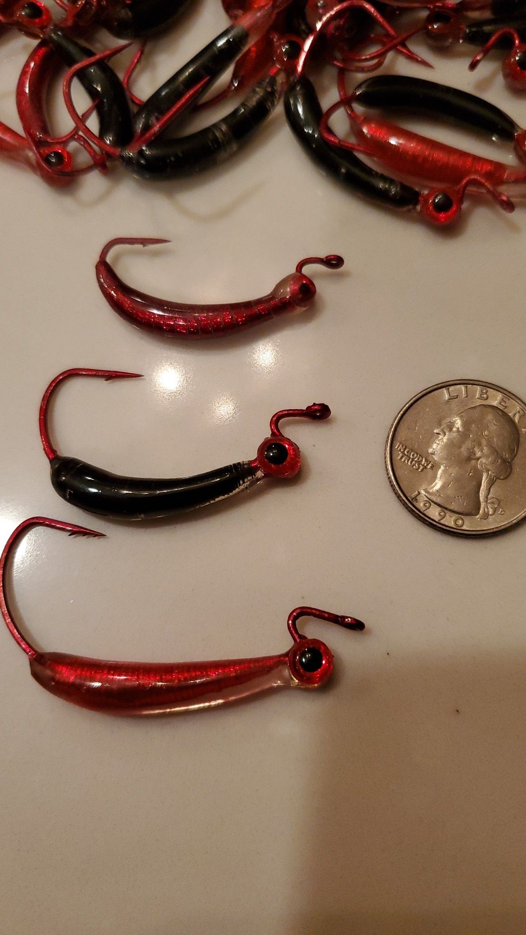 Fishing lures- weighted and coated jerk bait hooks