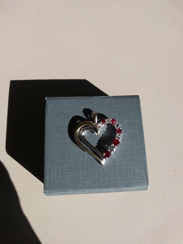 Ruby and white topaz heart pendant