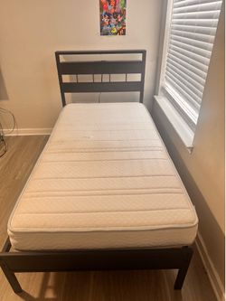 Twin bed frame with mattres