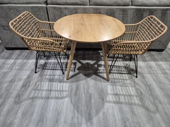 Wood Round Table With Two Rattan Chairs In Very Good Condition 