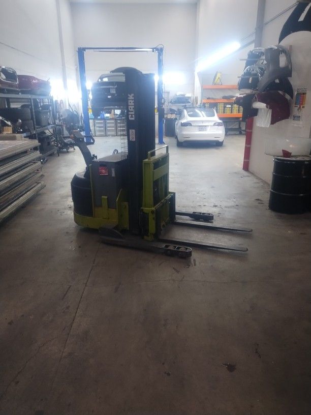 Selling Clark Pallet Jack Forklift With Charger And Has New Batteries