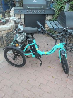 Three-Wheel electric bike. very strong battery charger. everything included don't need no more. got me a stronger one