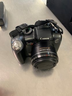 Canon power shot sx10is ( mega pixels 10.0 ) $ 100 or come layaway for $10 down