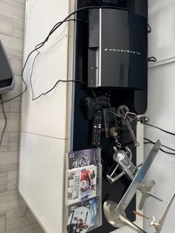 Sony PlayStation 3 Console with Controller and Games