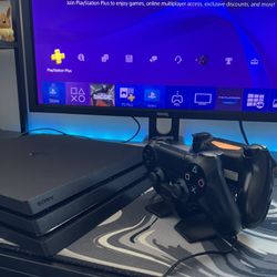 PS4 Pro + 2 Controllers + Charging Station