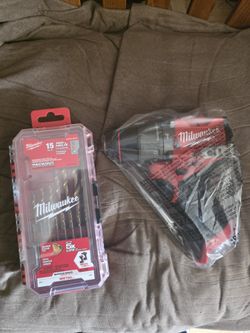 Milwaukee M12 Hammer Drill And Drills