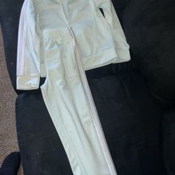 Adidas’s light green tracksuit, zip-up jacket and track pants, 
