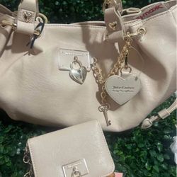 Juicy couture rolling on satchel bag