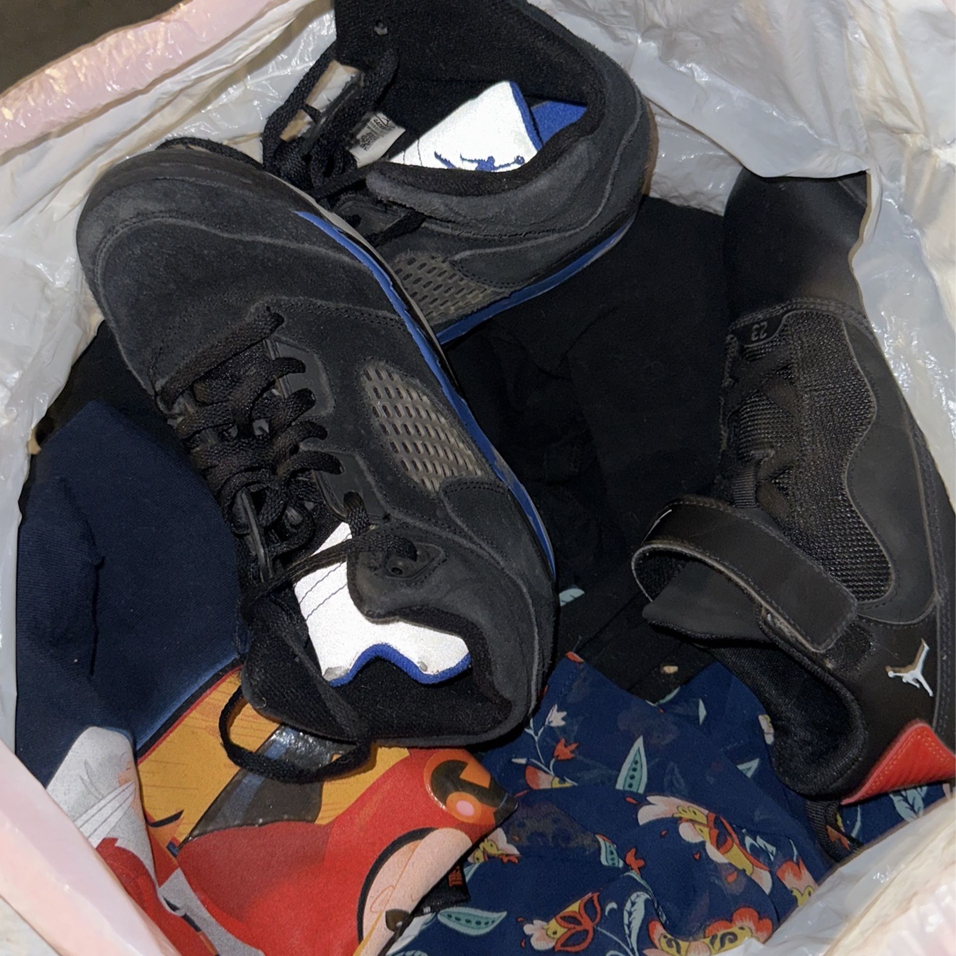 Bag Full Of Shoes And Clothes