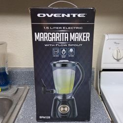 Brand new margarita maker with margarita glass Pickup Between 2;00-10:45 Rainbow/95 Cash Only Read Description 