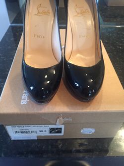 Christian Louboutin size 61/2 asking $450 obo