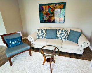 sofa with chair and table