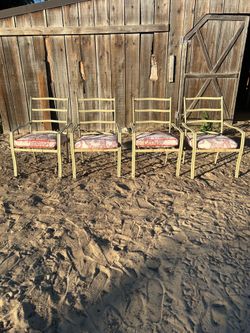 Four Outdoor Chairs with Coushins