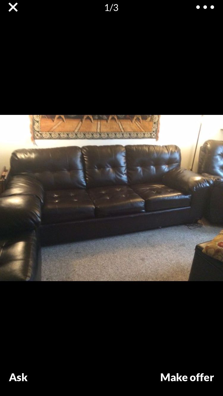 Sectional couches and a recliner