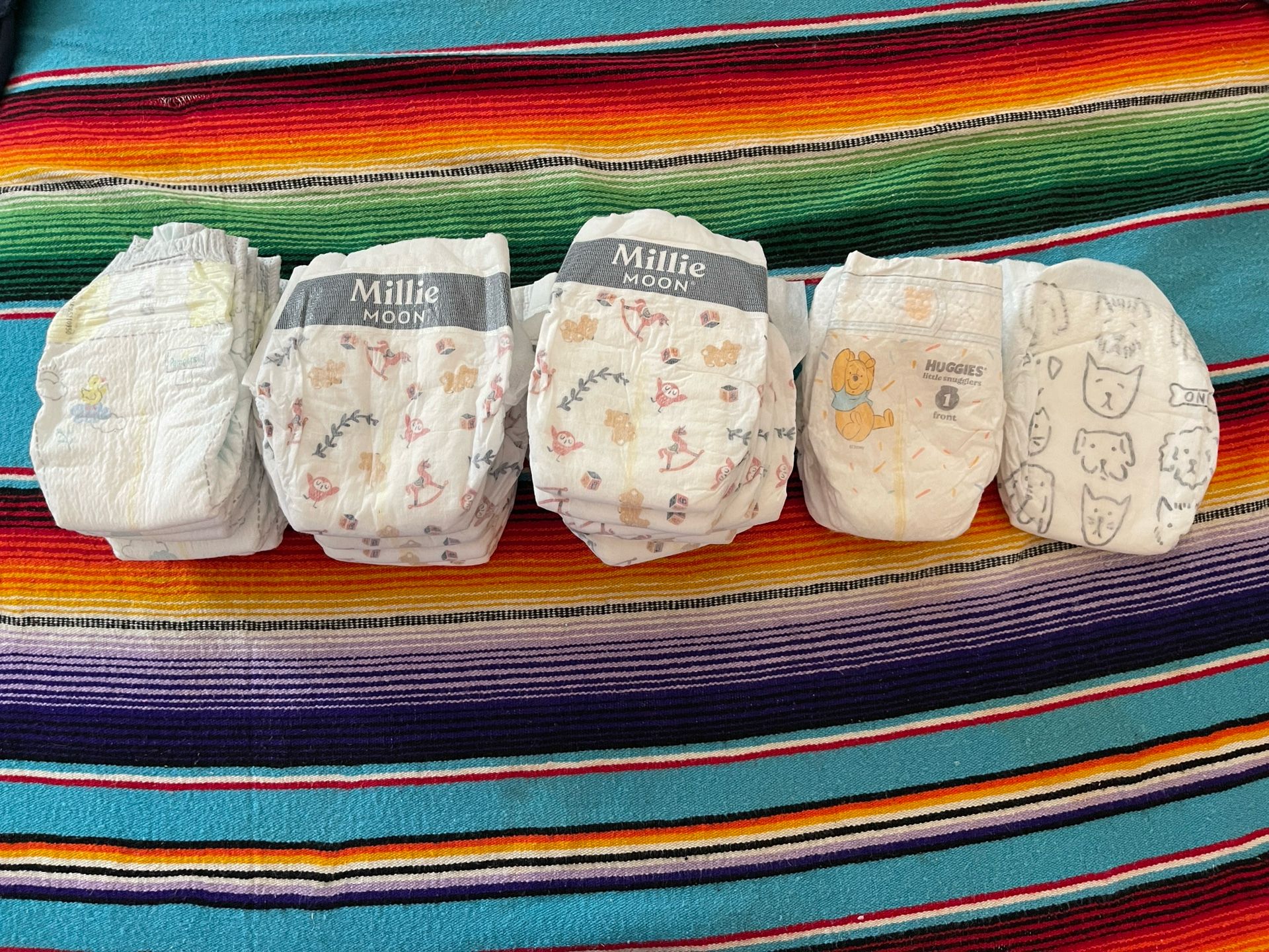 Diapers Size 1, 23 total, Assorted: Millie moon, Pampers, Huggies