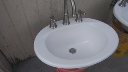 Two sinks with faucets and downspout what supply lines $200 for both or $80 a piece