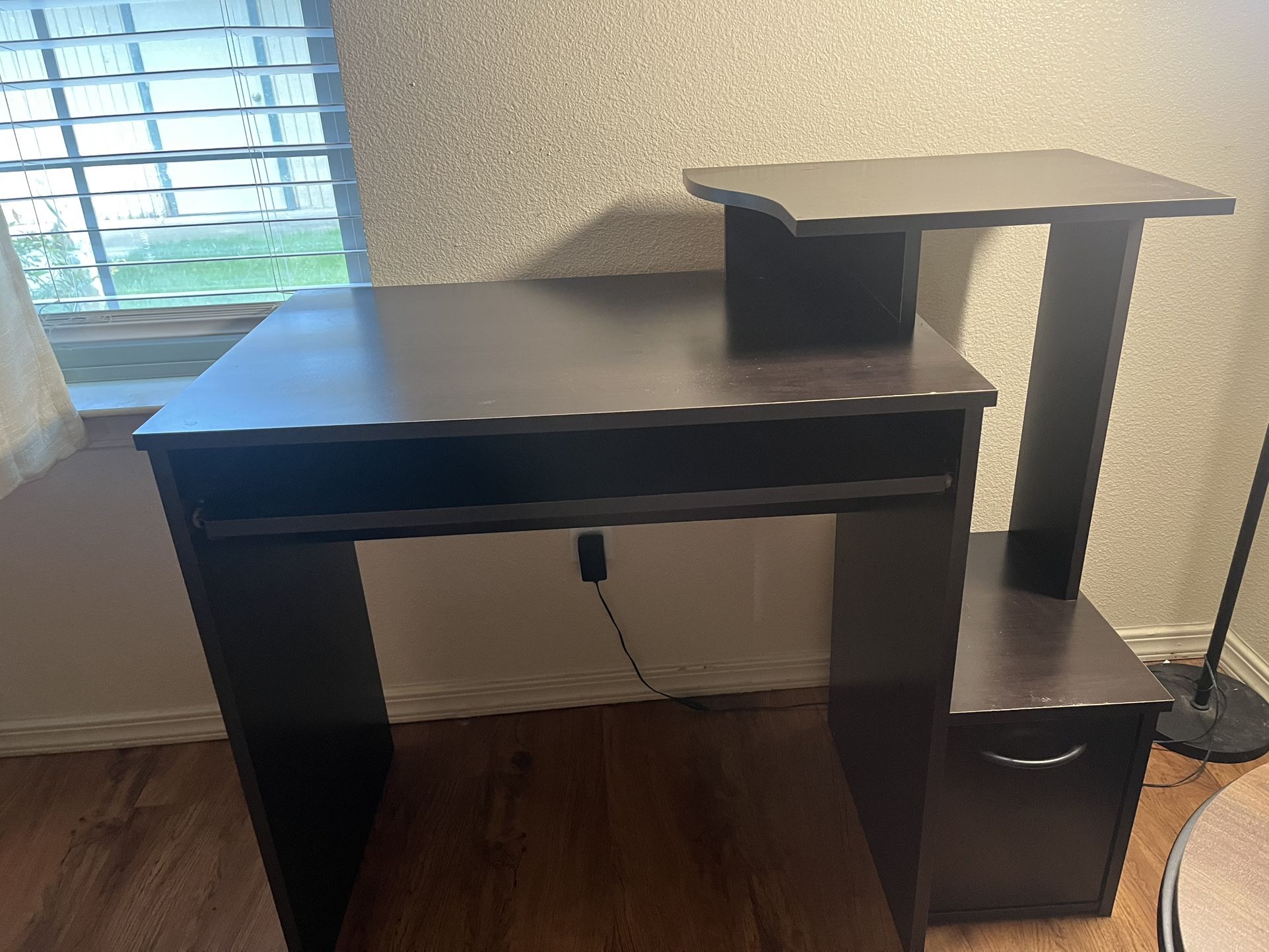 Expressing Computer Desk with Raised Shelf and Storage Drawer