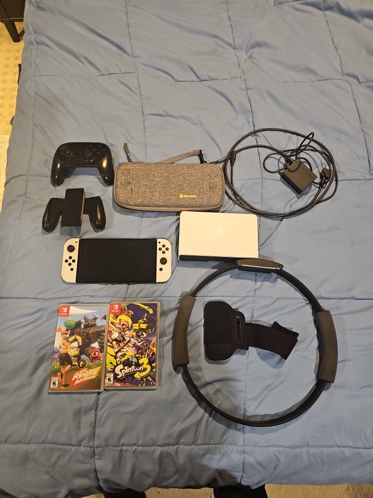 Nintendo Switch OLED with Pro Controller, Games, Case, And Microsd Card