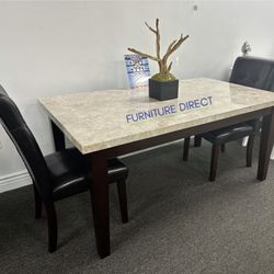 Beautiful Brown Wood Dining Table With Matching Brown Wood And Brown Leather Chairs With A Granite Countertop On Sale Now Don’t Miss Out