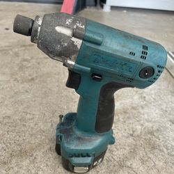 Makita Impact And Charger . Works Great ! Super Light Quality Tool
