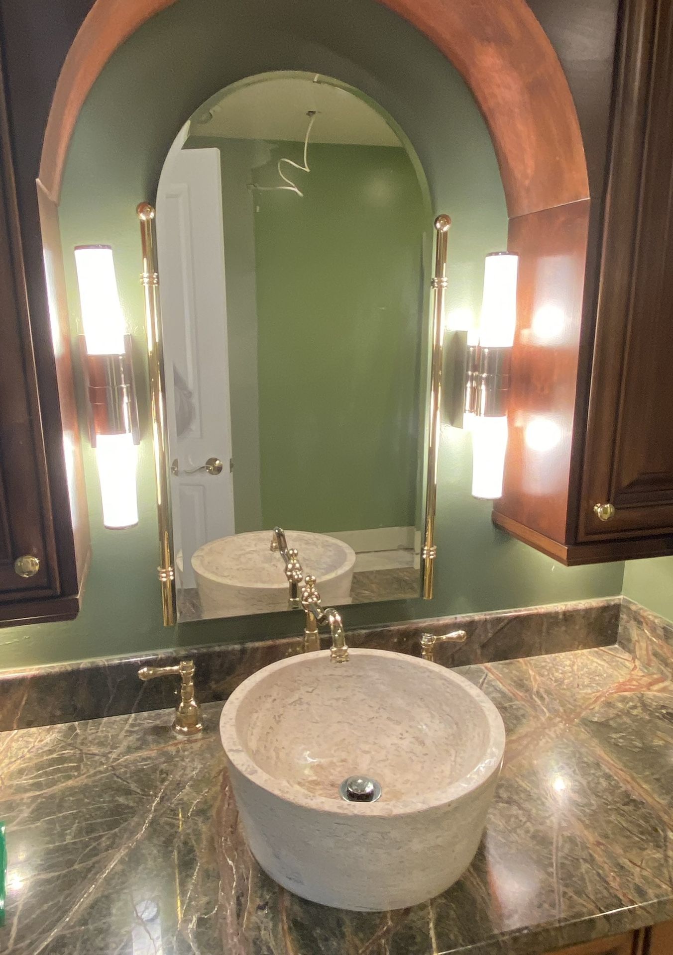 Custom Mirror And Stone Vessel Sink And High End Light Fixtures