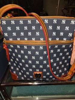 Authentic New York Dooney & Bourke purse with clutch