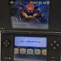 Nintendo DSI XL With Games