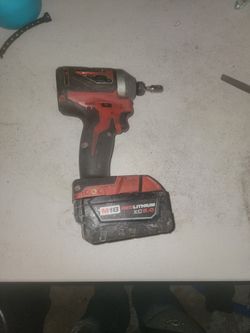 Milwaukee Impact 18 Volts And A Batery 125